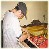 stringing a piano